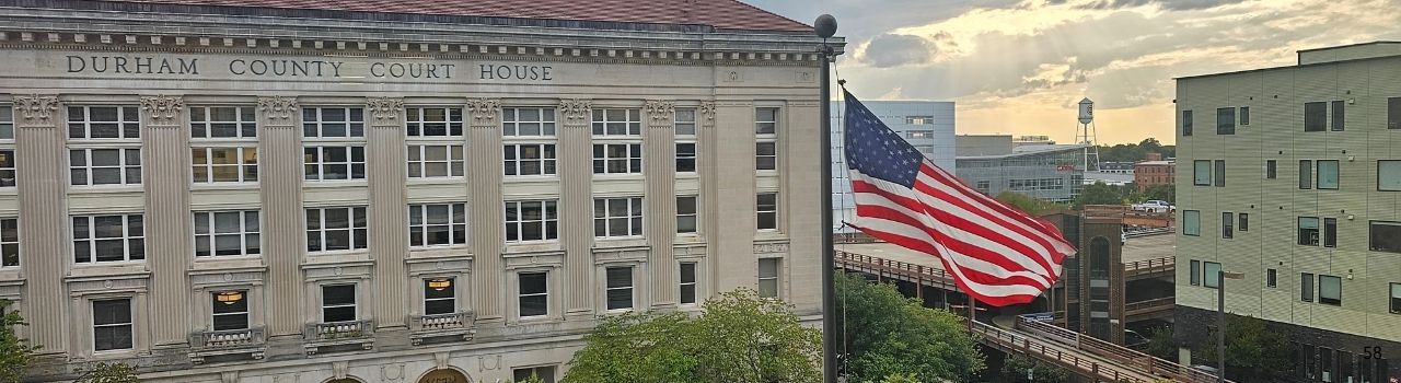 Durham County Administration One Building with flag flying