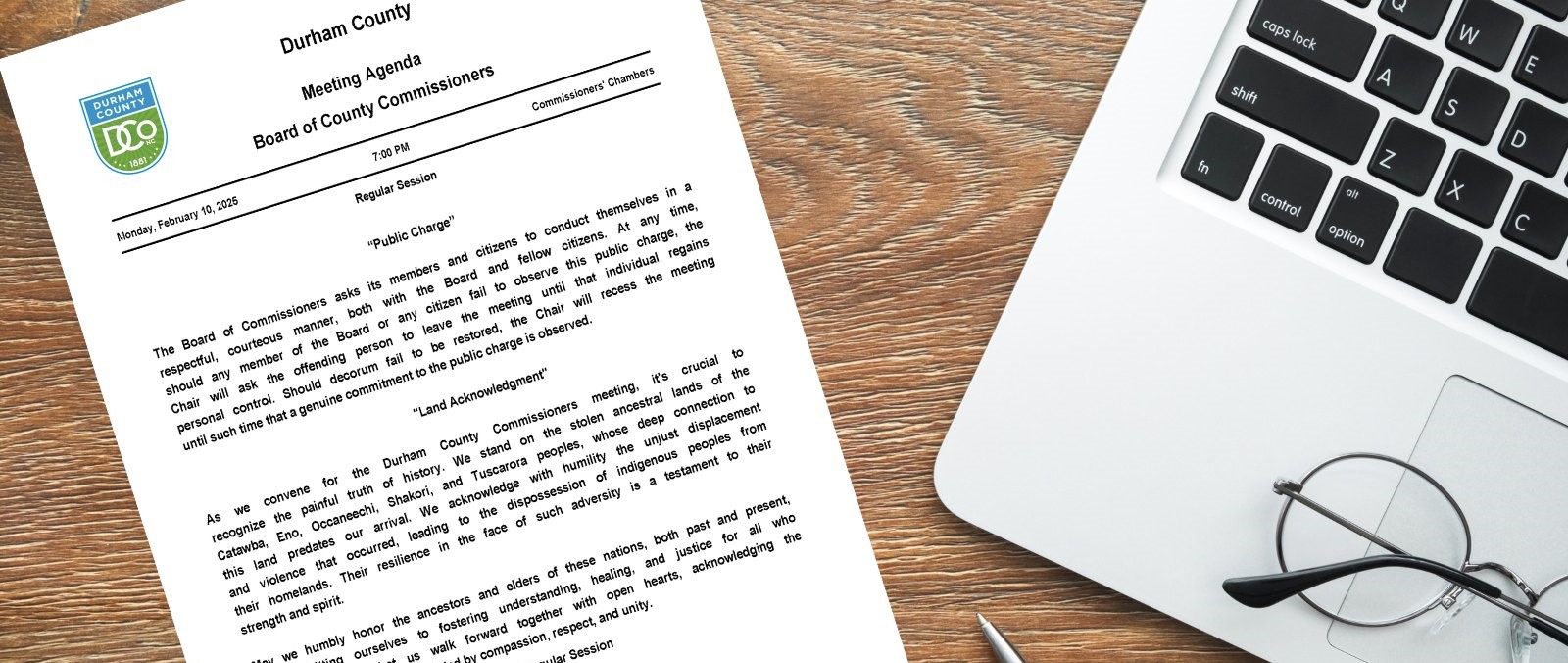 Meeting Agenda pic with a laptop