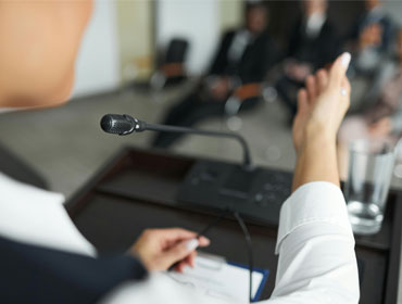 Person speaking on a mic