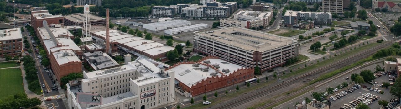 Durham skyline with railroad tracks.