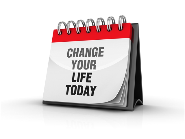 Calendar with note "Change Your Life Today"