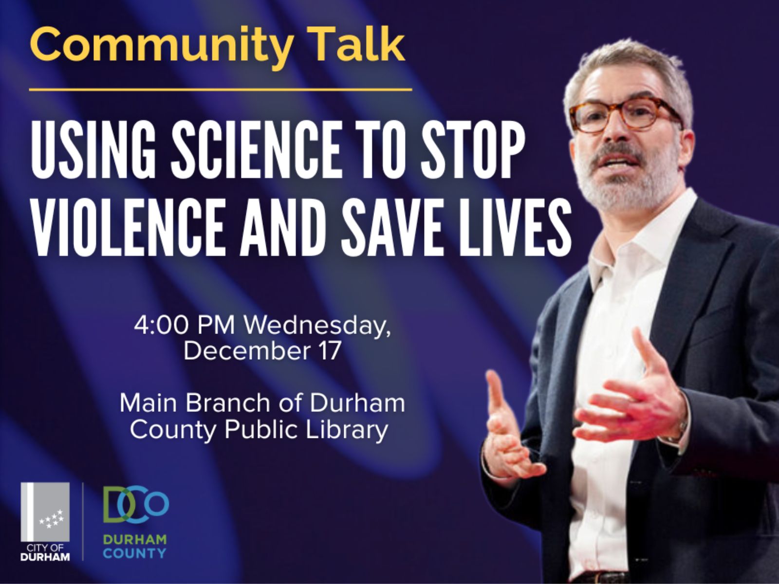 Bus drives down street in downtown Durham.