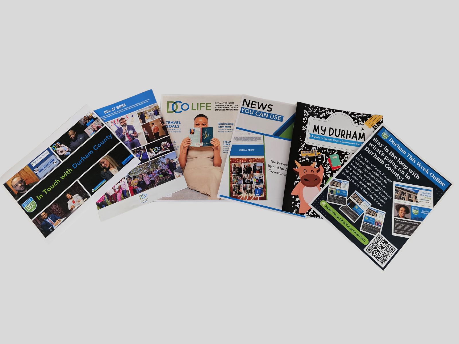 Durham County Public Information Publications lay together on a desktop.