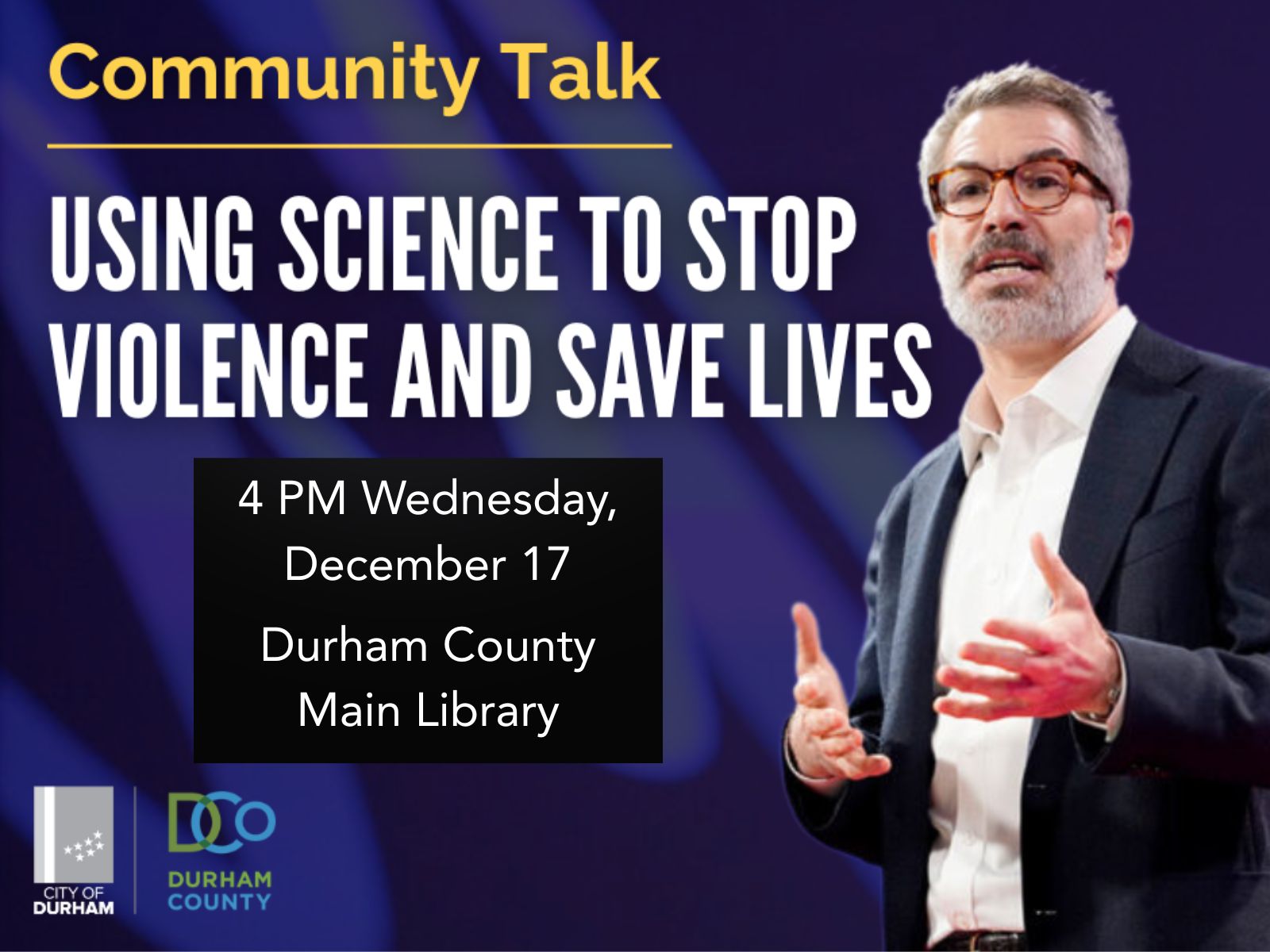 Bus drives down street in downtown Durham.