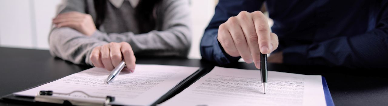 Man and woman reviewing documents