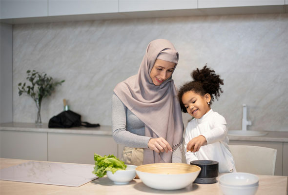 family in the kitchen cooking